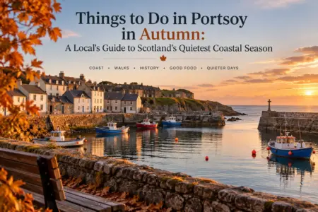 Autumn view of Portsoy harbour with fishing boats, stone cottages and golden coastal light in Scotland