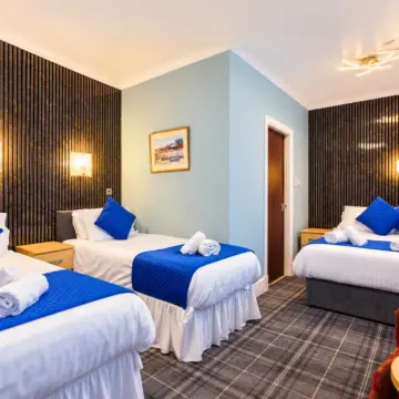 Modern Triple-Bed Hotel Room